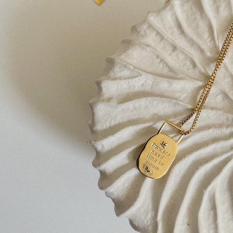 Gold bloom affirmation necklace