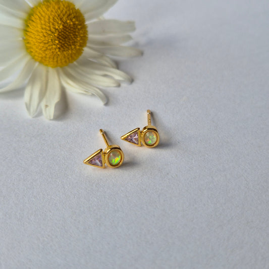 flat lay of Sorella of May Delta stud earrings