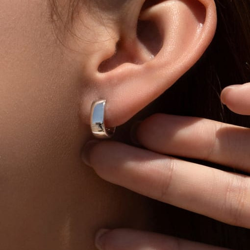Close up of Eliot earring being worn