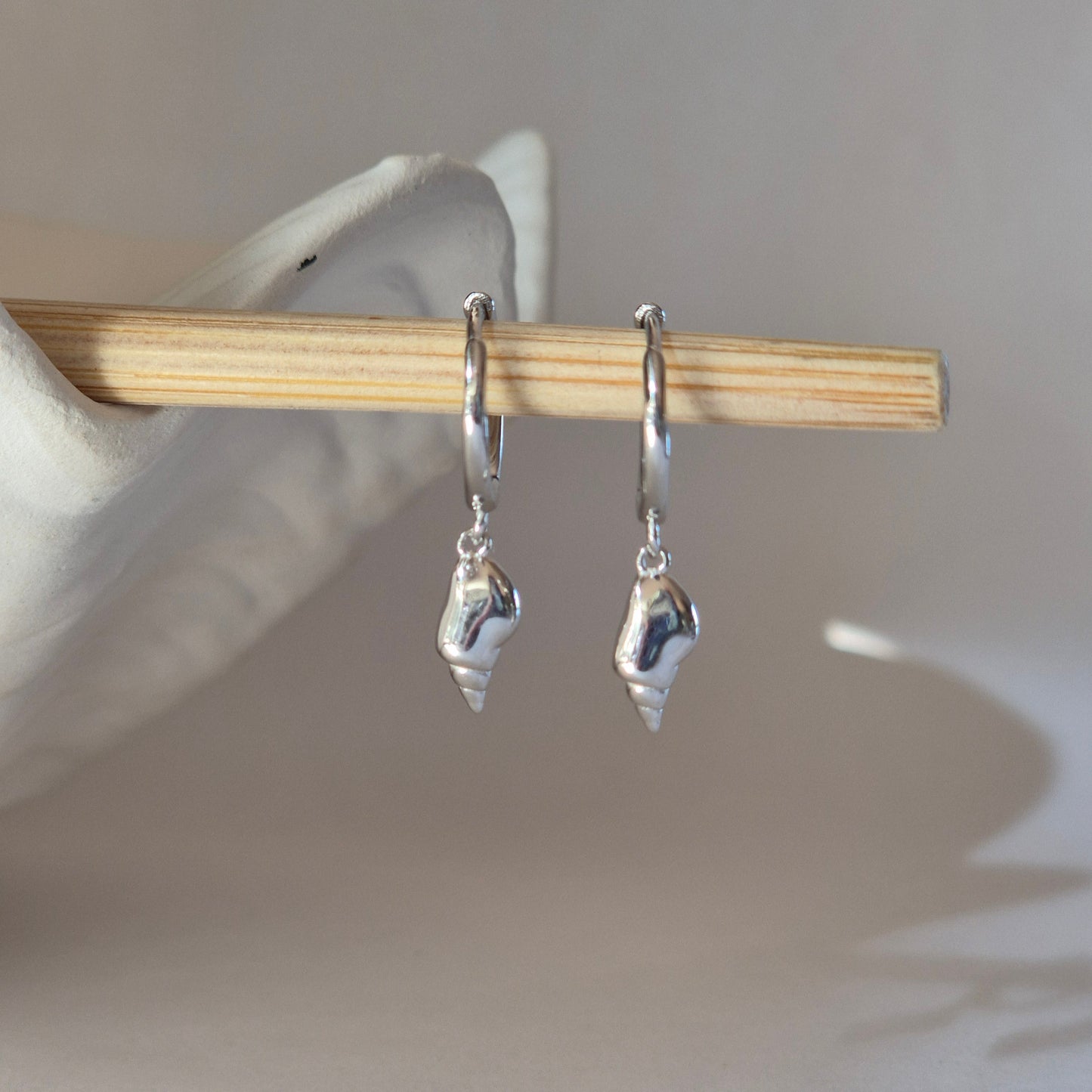 Sorella of May Ocean Shell earrings on prop