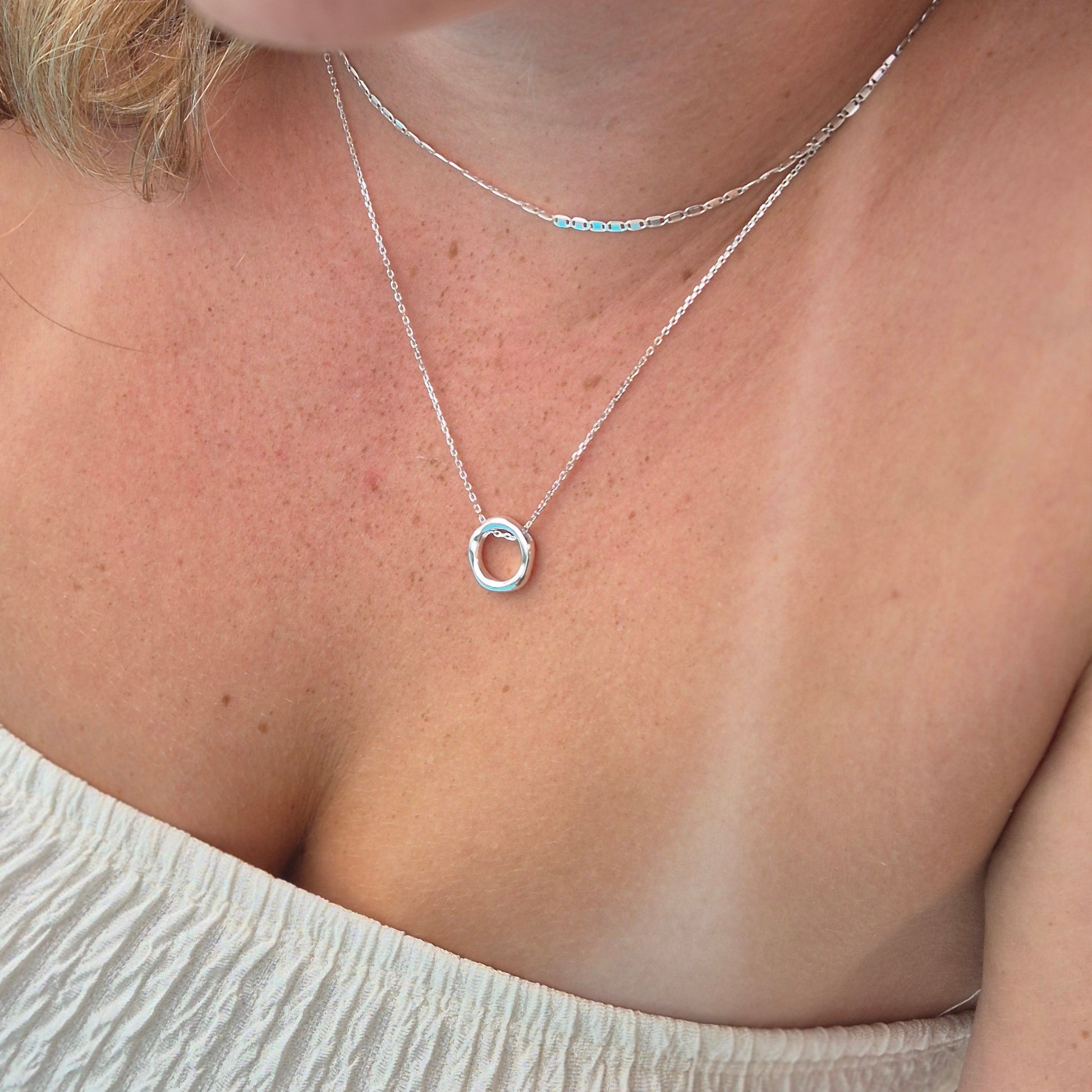 Sorella of May Gwen cirlce pendant necklace worn on model