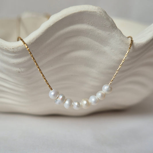 Sorella of May nerina necklace on dish